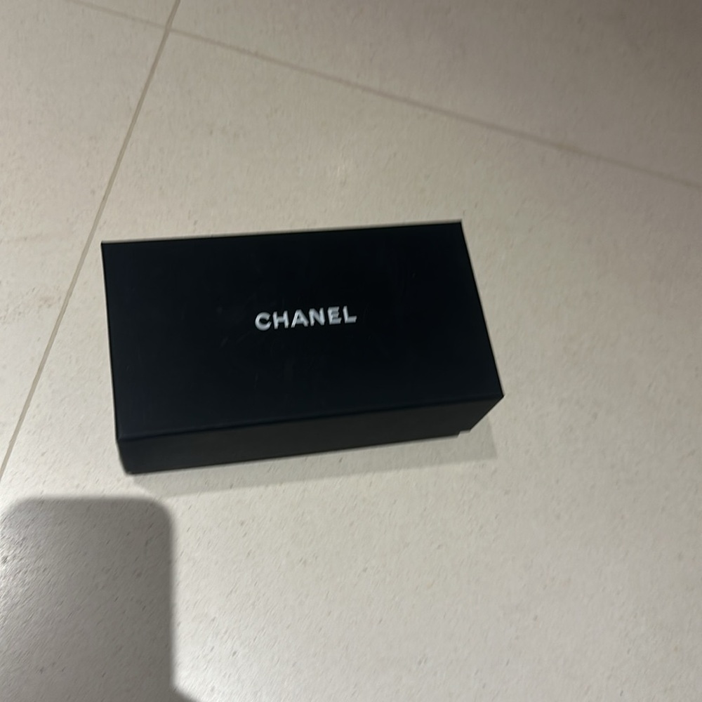 Authentic Chanel sunglasses box.